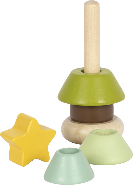 Bébé manipulando la pirámide de anillas de madera de Navidad y explorando el orificio sensorial